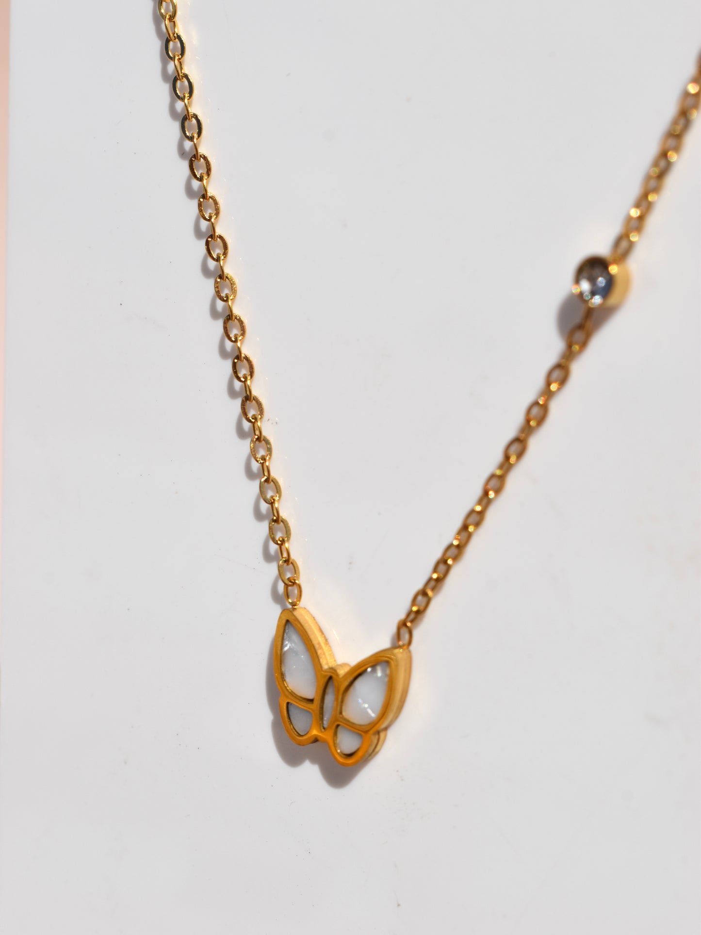 Butterfly pearl necklace